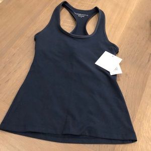 Navy Beyond Yoga top w/ trim detail. NWT